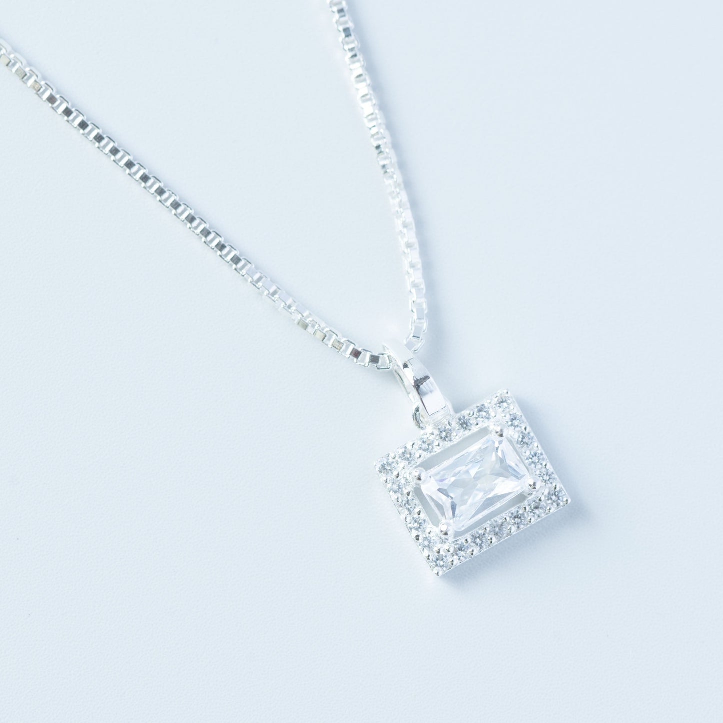 Radiant Halo Rectangle Pendant
